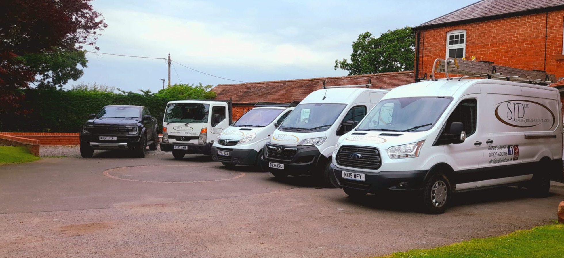 Van fleet of SJD Builders in Cumbria.