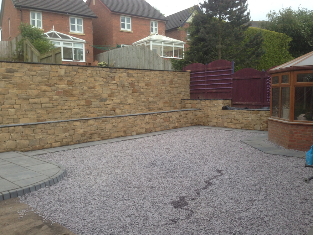 Stone retaining wall to Carlisle property.